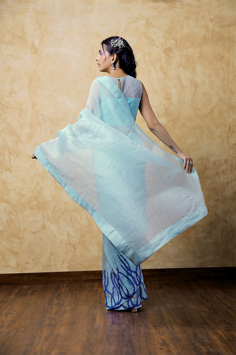 Aqua Blue Organza Saree with Patch Work and Chandelier Lace Blouse with Flower